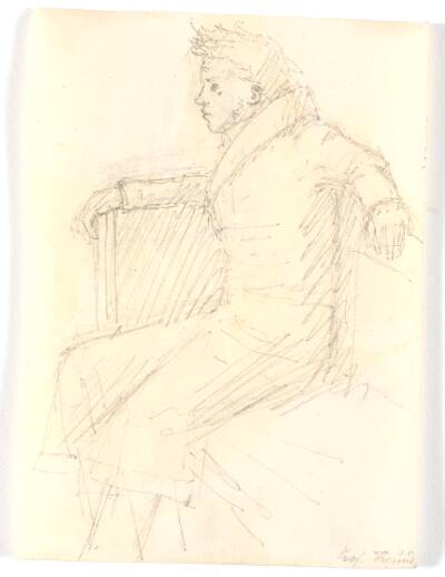 H.E. Freund siddende i en sofa