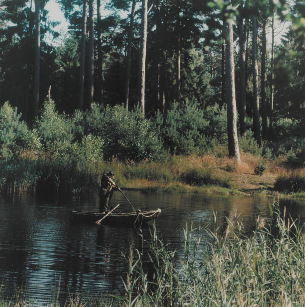 The Lake (The hunter taking aim at the boat) 8 by Peter Land