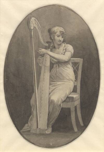 En dame der spiller på harpe