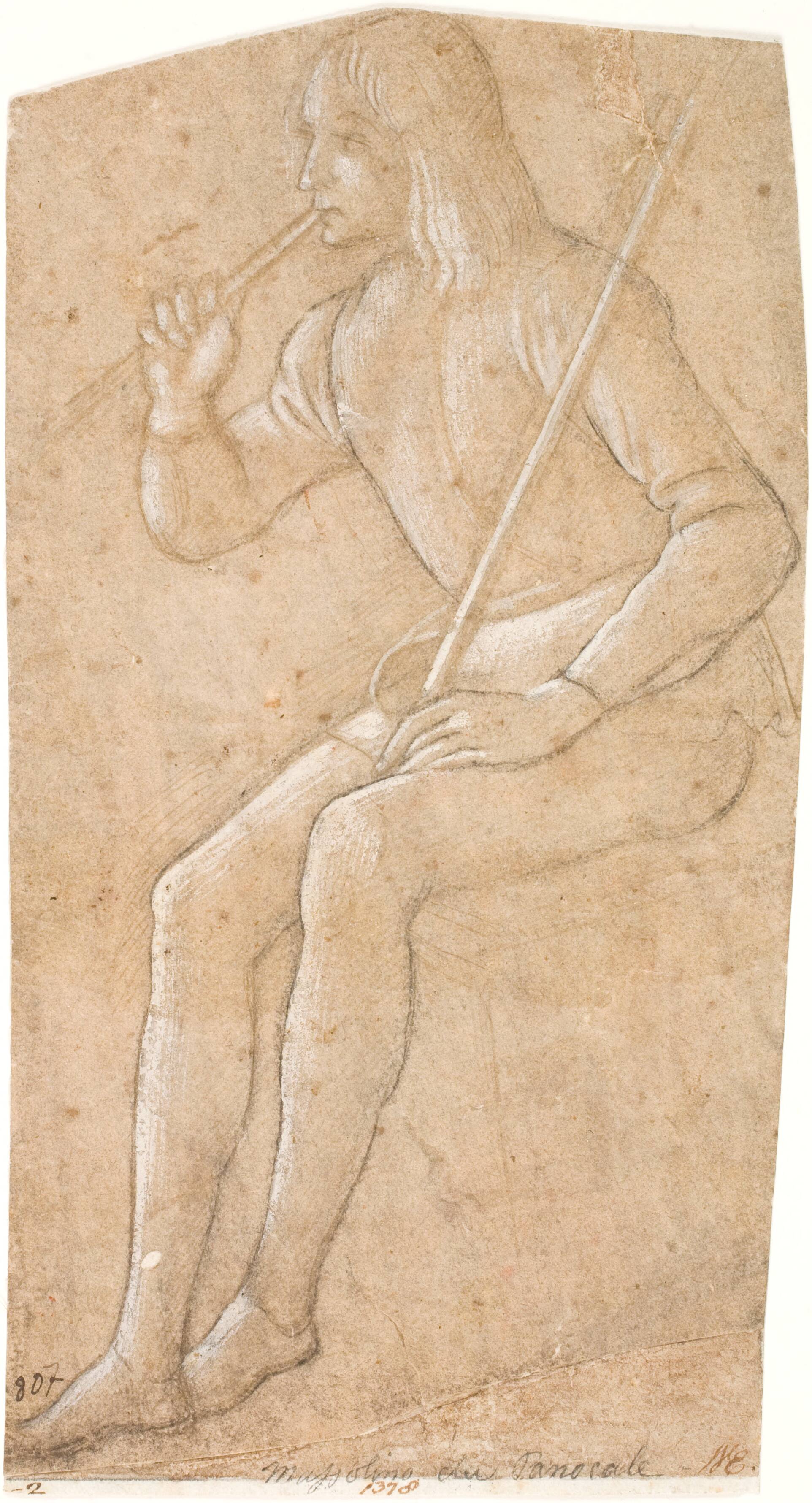 Seated young man with a stick playing the flute