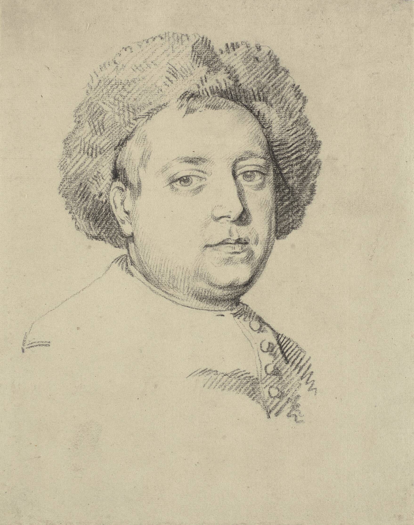 Head and shoulder portrait of a man in a fur cap
