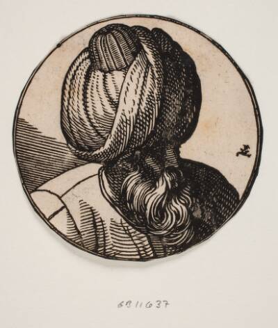 Cirkulær medaljon med brystbillede af mand med turban, set diagonalt oppe fra, 3/4 profil t.h.