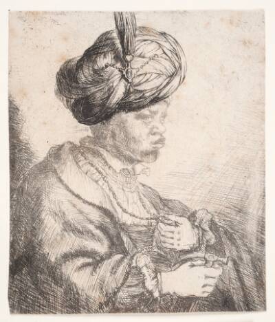 Afrikaner med fjerprydet turban