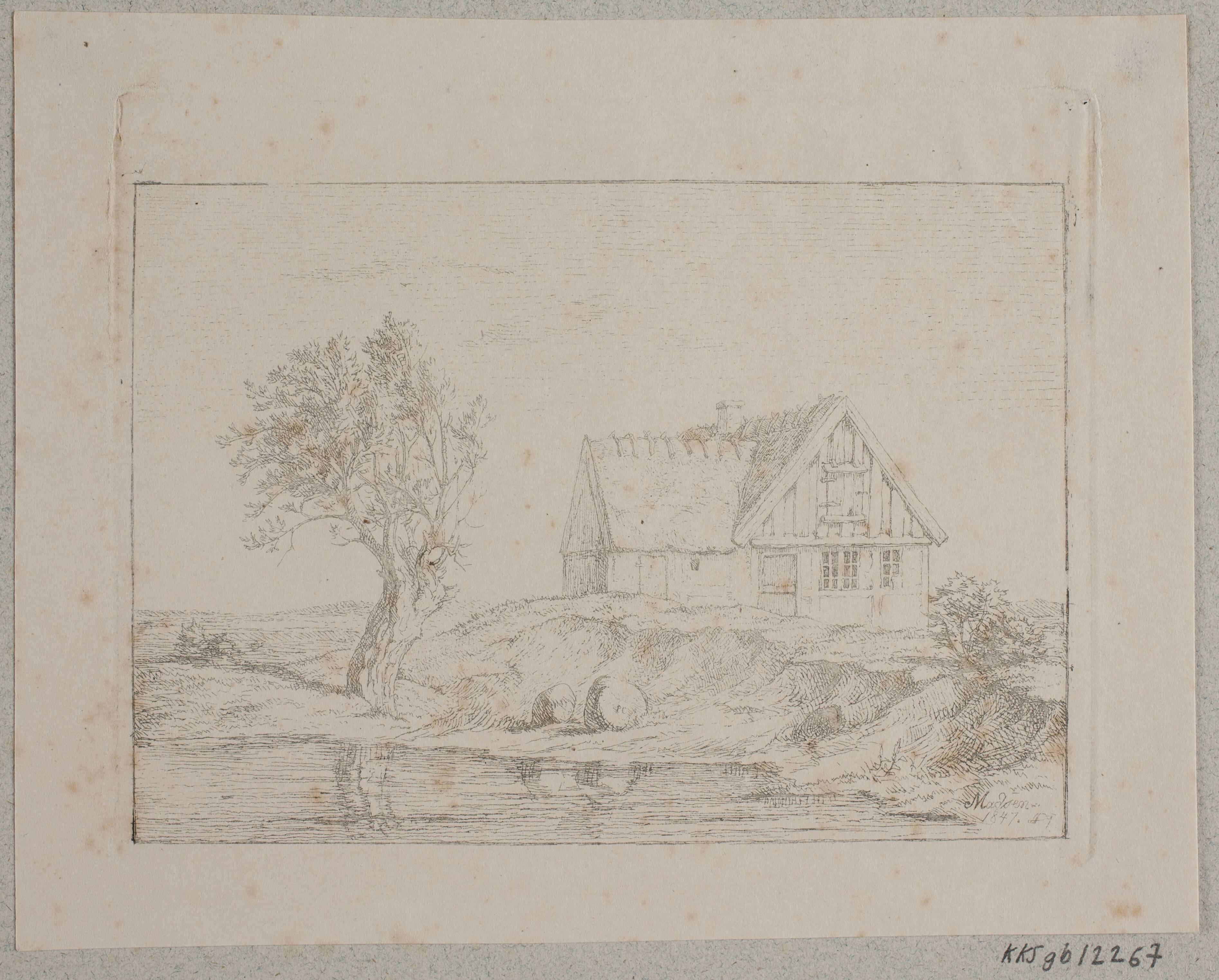 Bondehus ved et vand
