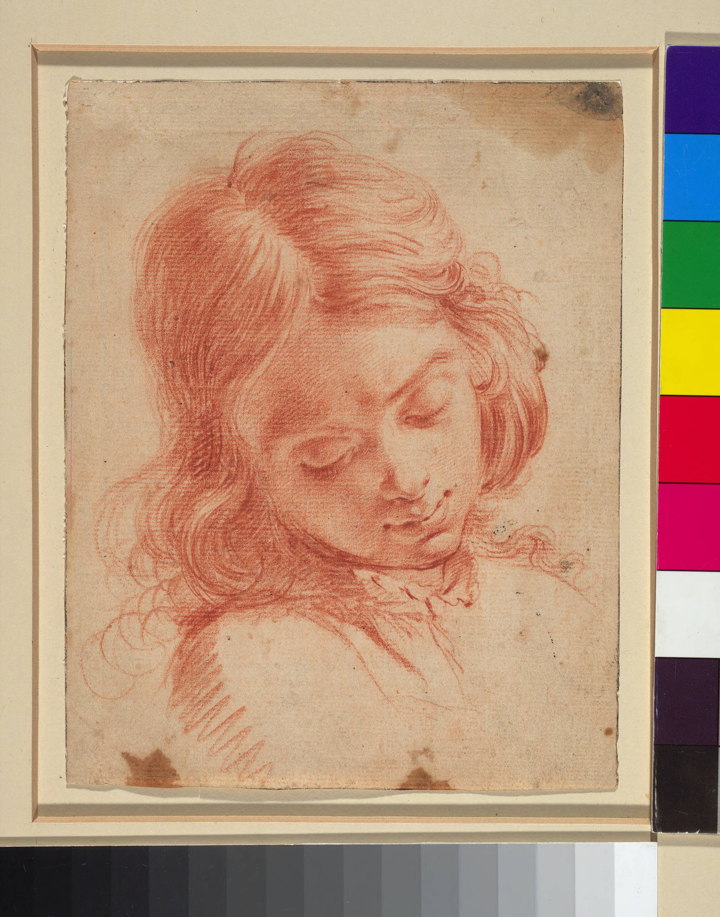 Bust of a boy looking down