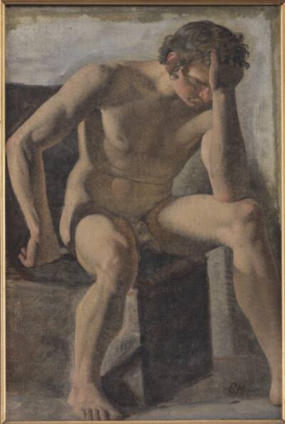 Siddende mandlig model