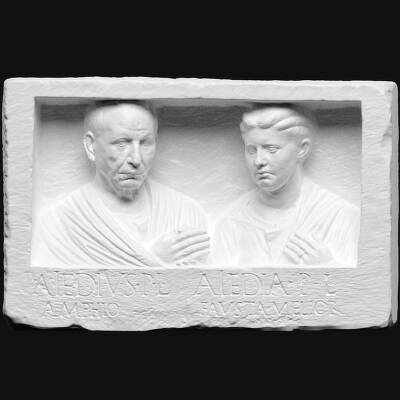 Gravrelief. Mands- og kvindebuste i niche. Publius Aiedius Amphio & Aiedia Fausta Melior