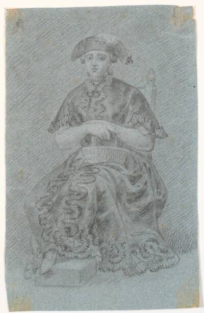 Siddende dame med hat. Kostumefigur?