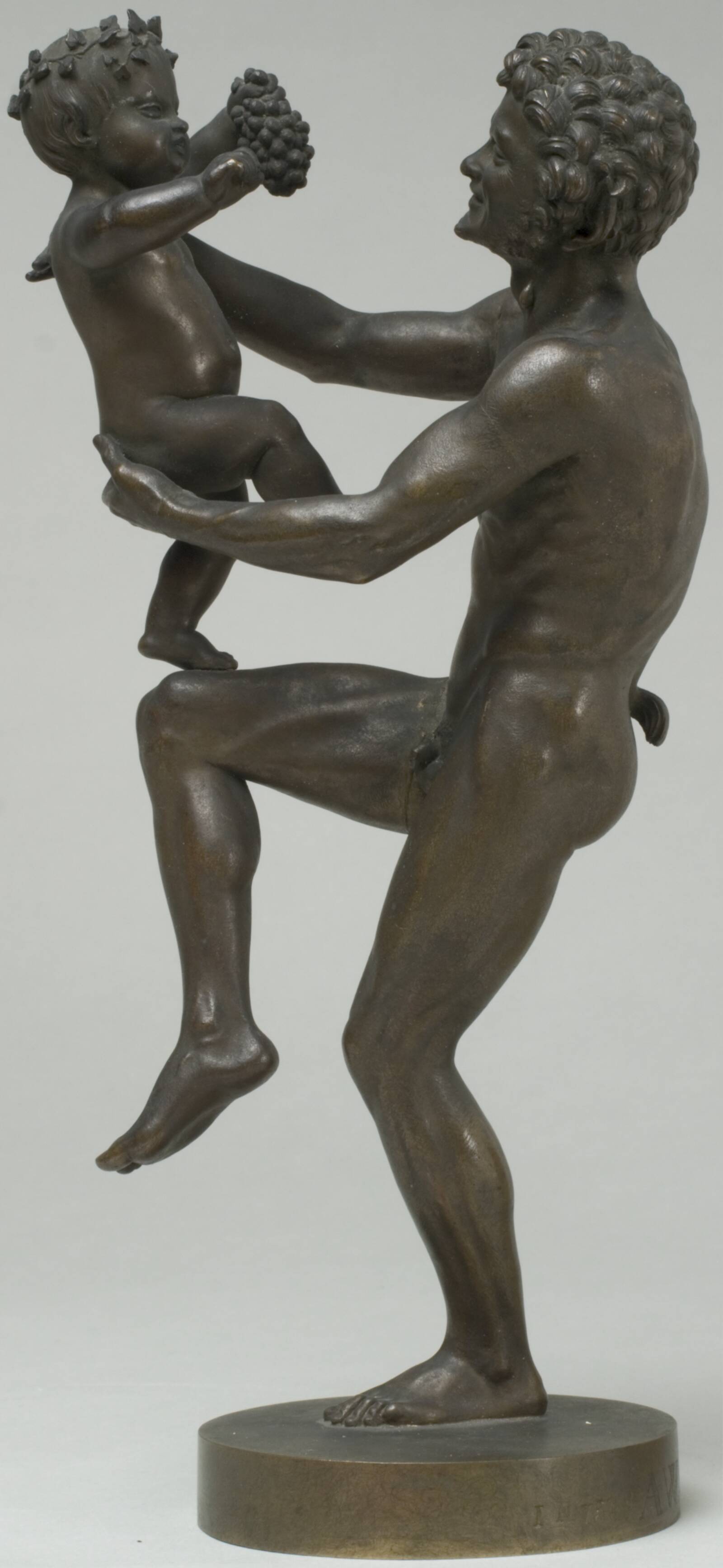 En dansende satyr, som holder Bacchusbarnet, August Saabye, 1859