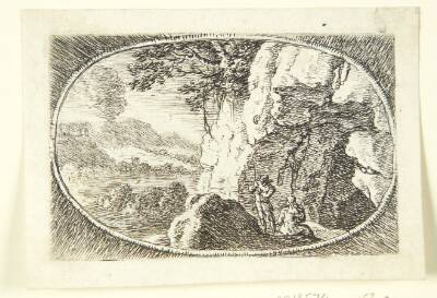 Mand og kvinde ved en grotte